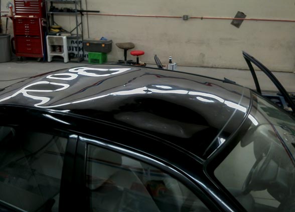 2001 Mazda Protege with Roof Dents