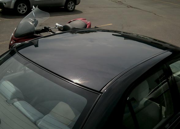 2001 Mazda Protege with Roof Dents