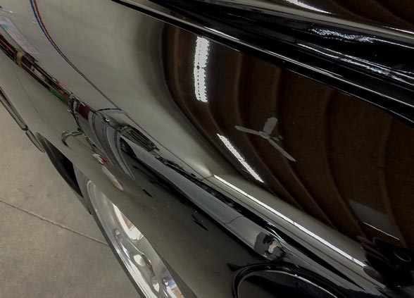 2002 Pontiac Trans Am with Dents in Fender